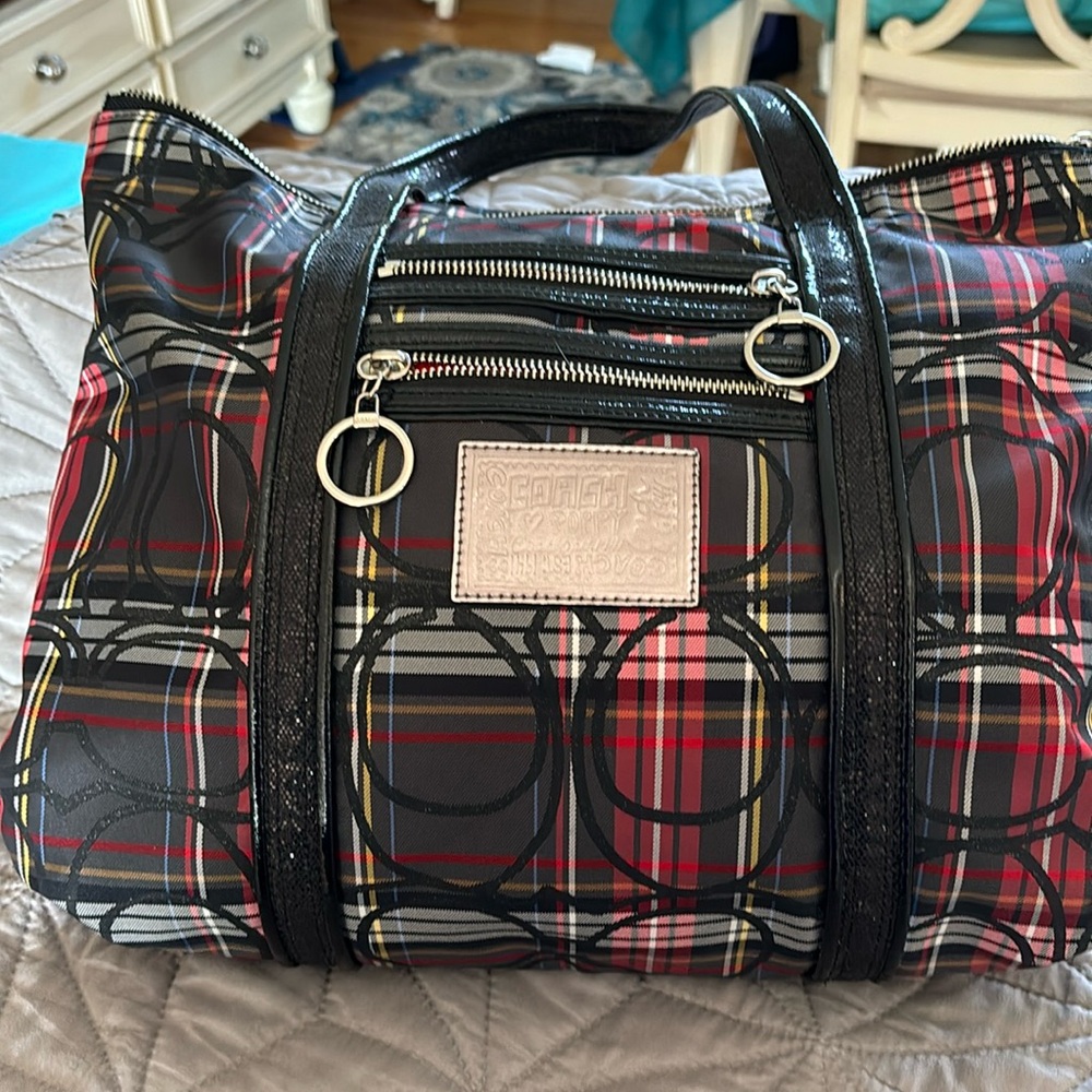 Vintage poppy coach. Red plaid material and black sparkling straps.